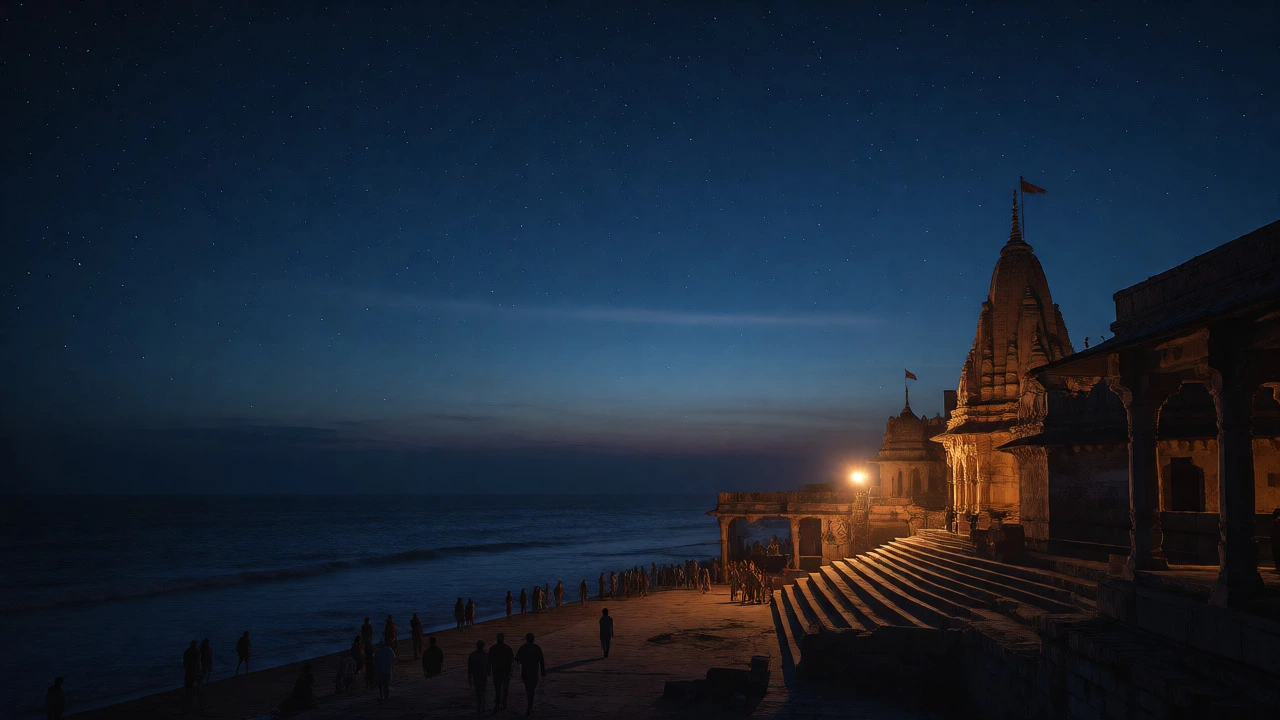 Dwarkadhish Temple lit up at dusk overlooking the Arabian Sea